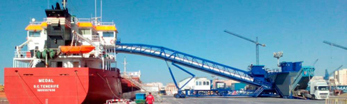 Puesta en funcionamiento, a modo de prueba, de un sistema pionero que permite exportar clínker a través del puerto de Málaga