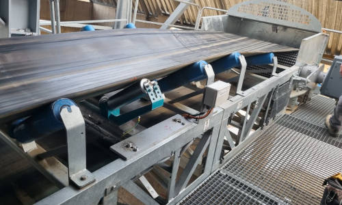 Detalle de uno de los sistemas de pesaje continuo instalado en cinta transportadora | Arco Electrónica
