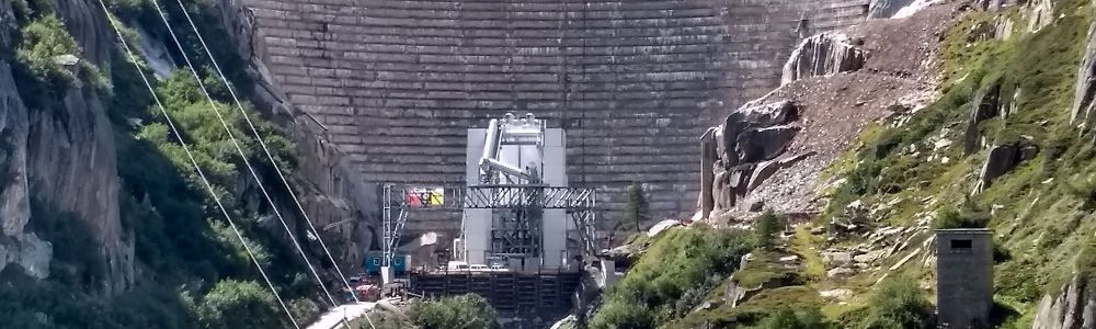 Spectacular construction site in the Swiss Alps | SBM Linemix® produces dam wall concrete under most extreme conditions